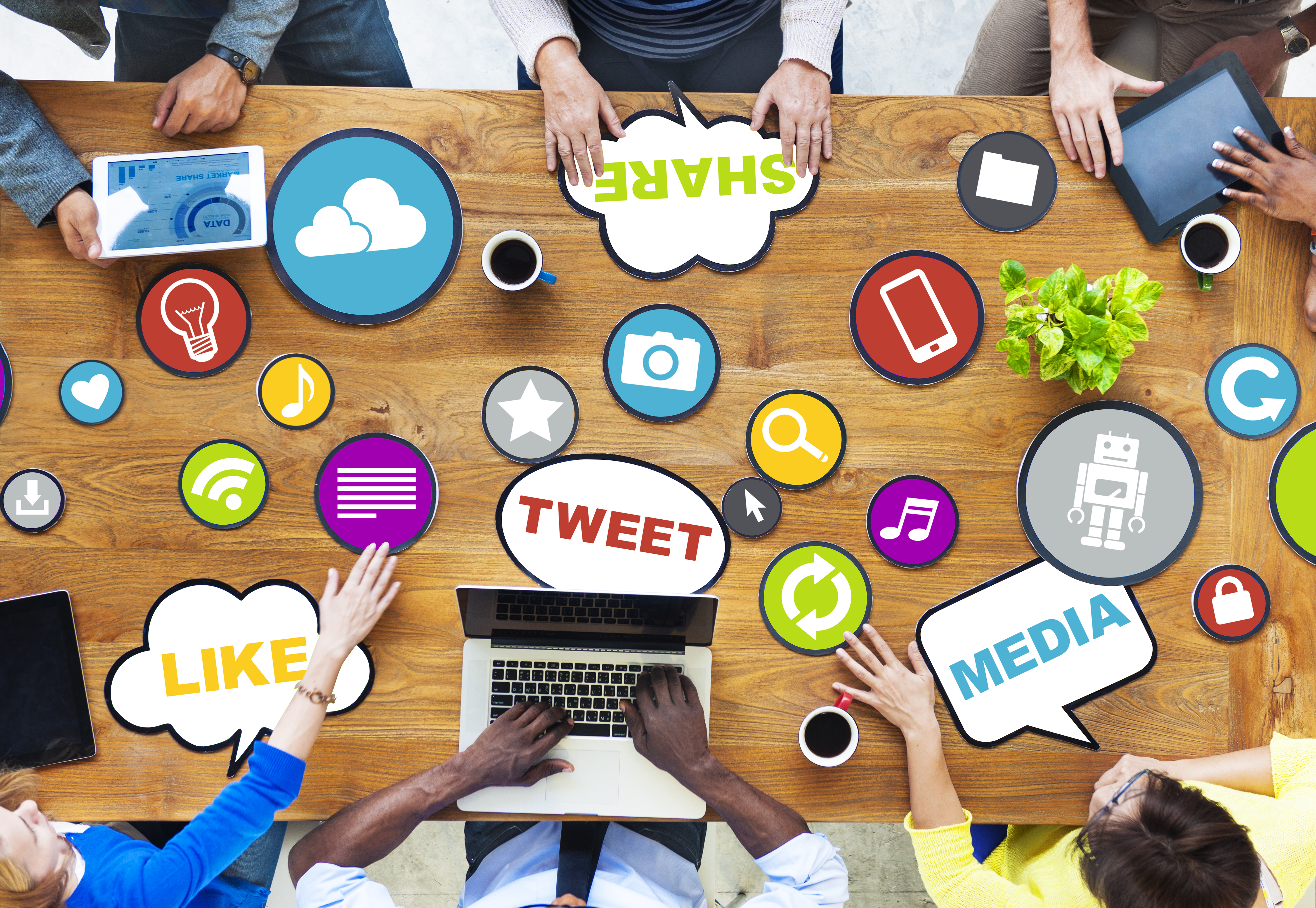 Desk with stickers of different social media platforms